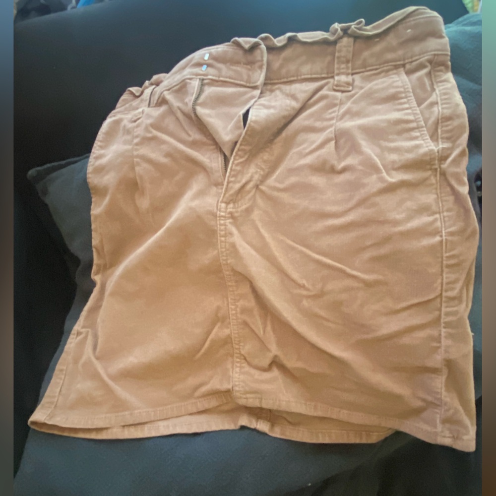 Express corduroy mini skirt. Sz:8 Tan colored. Used great condition. 2 pockets.
